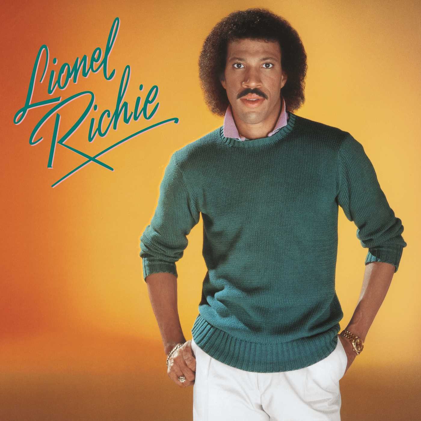 Lionel Richie in a green sweater with purple polo shirt on the cover of his 1982 self-titled solo debut